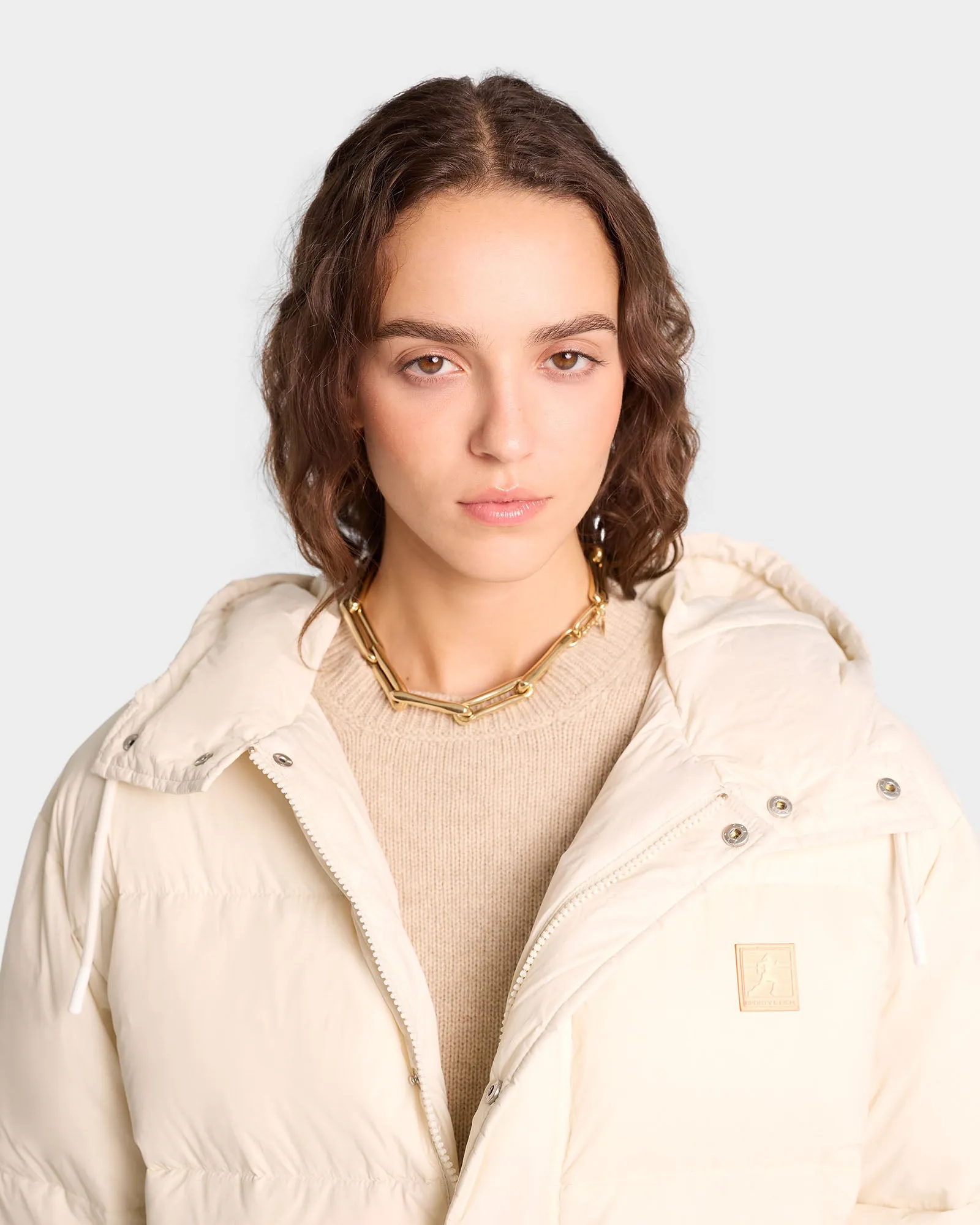 Running Woman Puffer Jacket - Off White